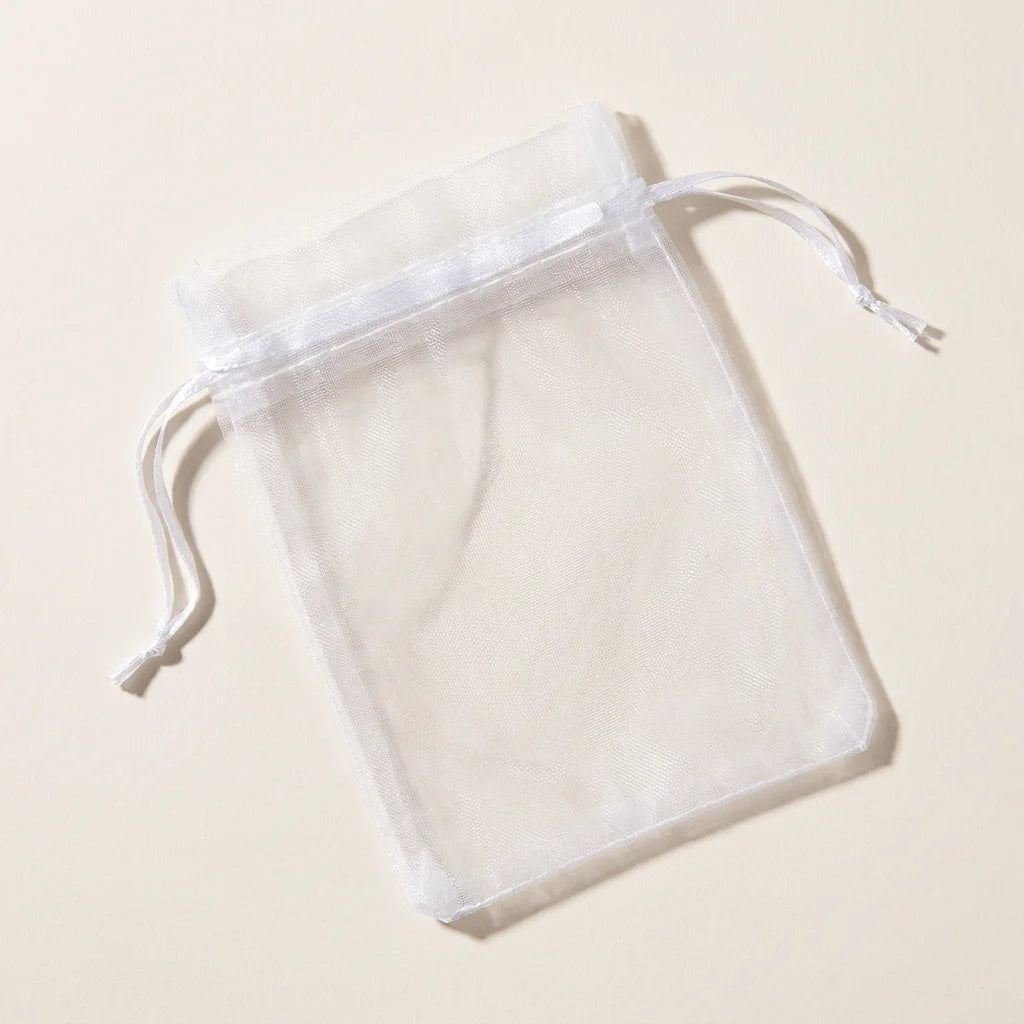 Sheer white drawstring soap-saver bag